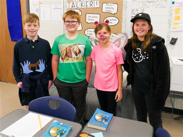 Fifth Graders putting on a Pun Fashion Show.